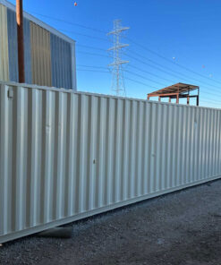 40' HIGH CUBE CONTAINER CUSTOM 8X12' OFFICE WITH BUILT-IN WORKSTATIONS, CENTRAL HVAC, STORAGE CABINETS & AJUSTABLE HEAVY DUTY STEEL SHELVING IN STORAGE AREA. THIS IS A SUPER NICE UNIT AND WOULD MAKE A GREAT PROJECT MANAGERS OFFICE AND TOOL CRIB